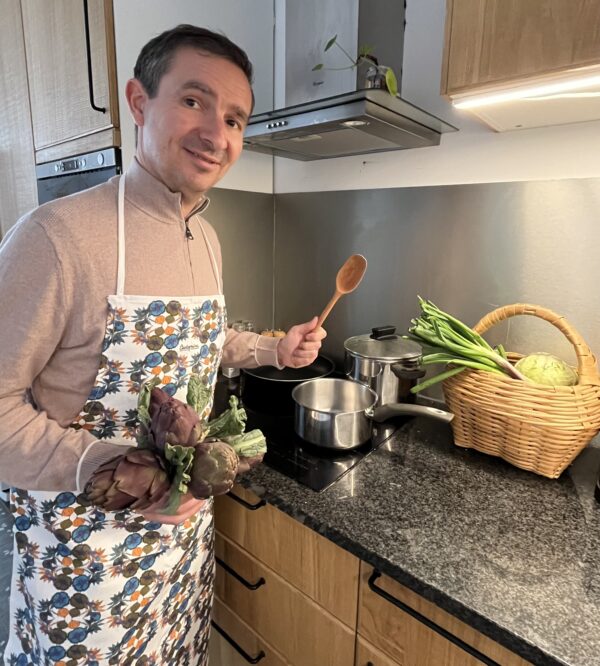 Orange-coloured apron worn